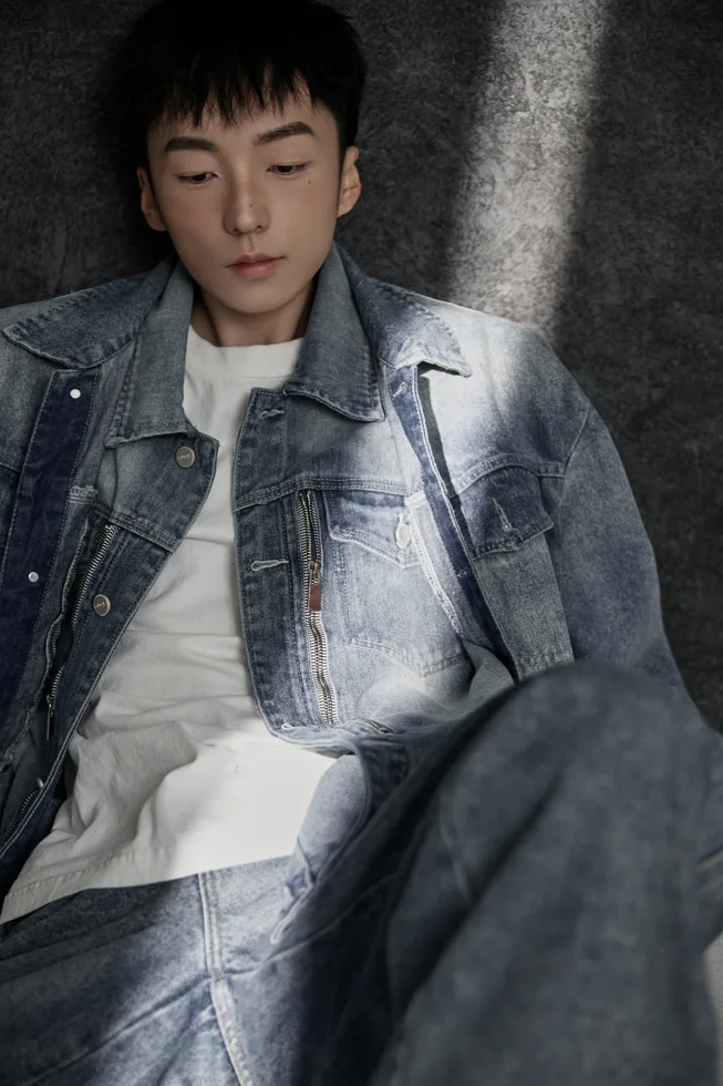 Relaxed seated denim portrait of Z·GY